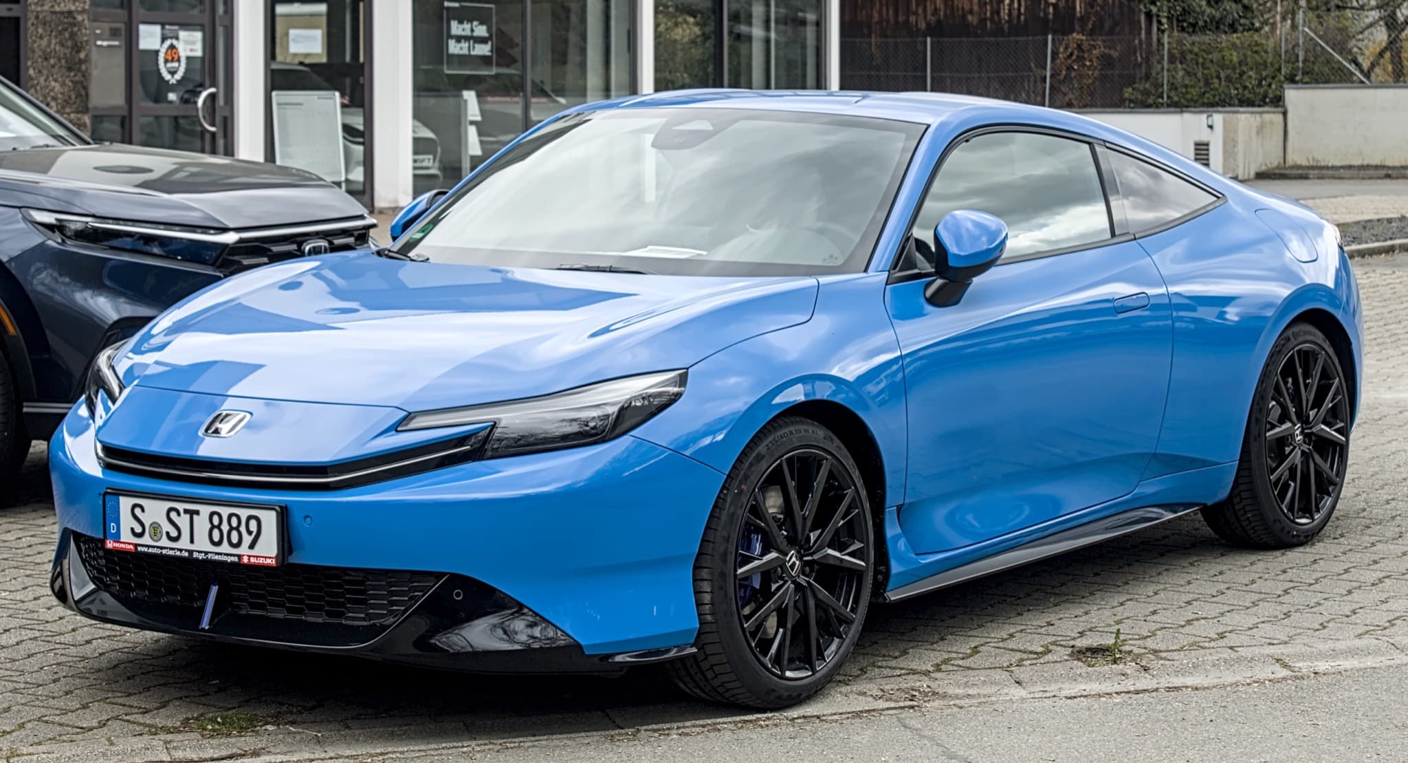 2026 Honda Prelude sport hybrid coupe in Boost Blue Pearl, front three-quarter view