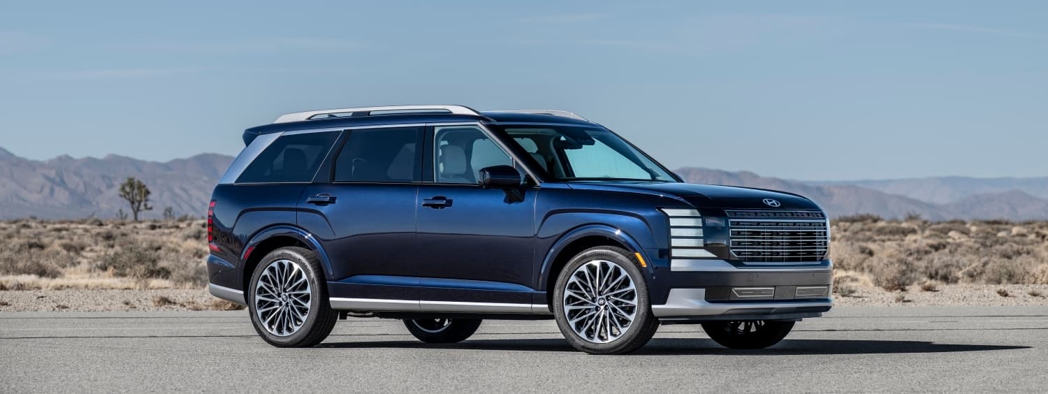 2026 Hyundai Palisade Hybrid Calligraphy in blue, official Hyundai press image