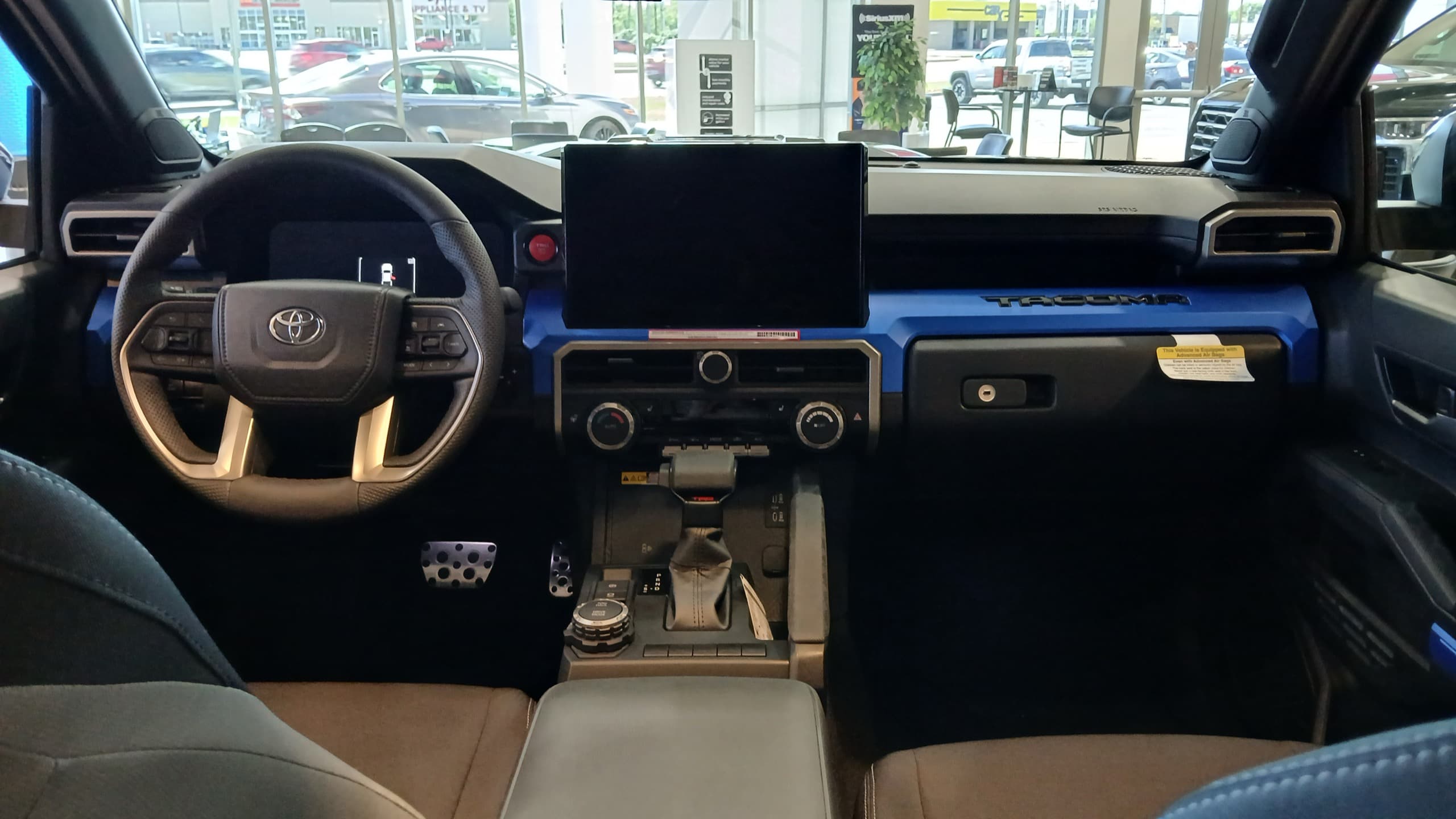 Fourth-generation Toyota Tacoma TRD Sport dashboard with the available 14-inch touchscreen