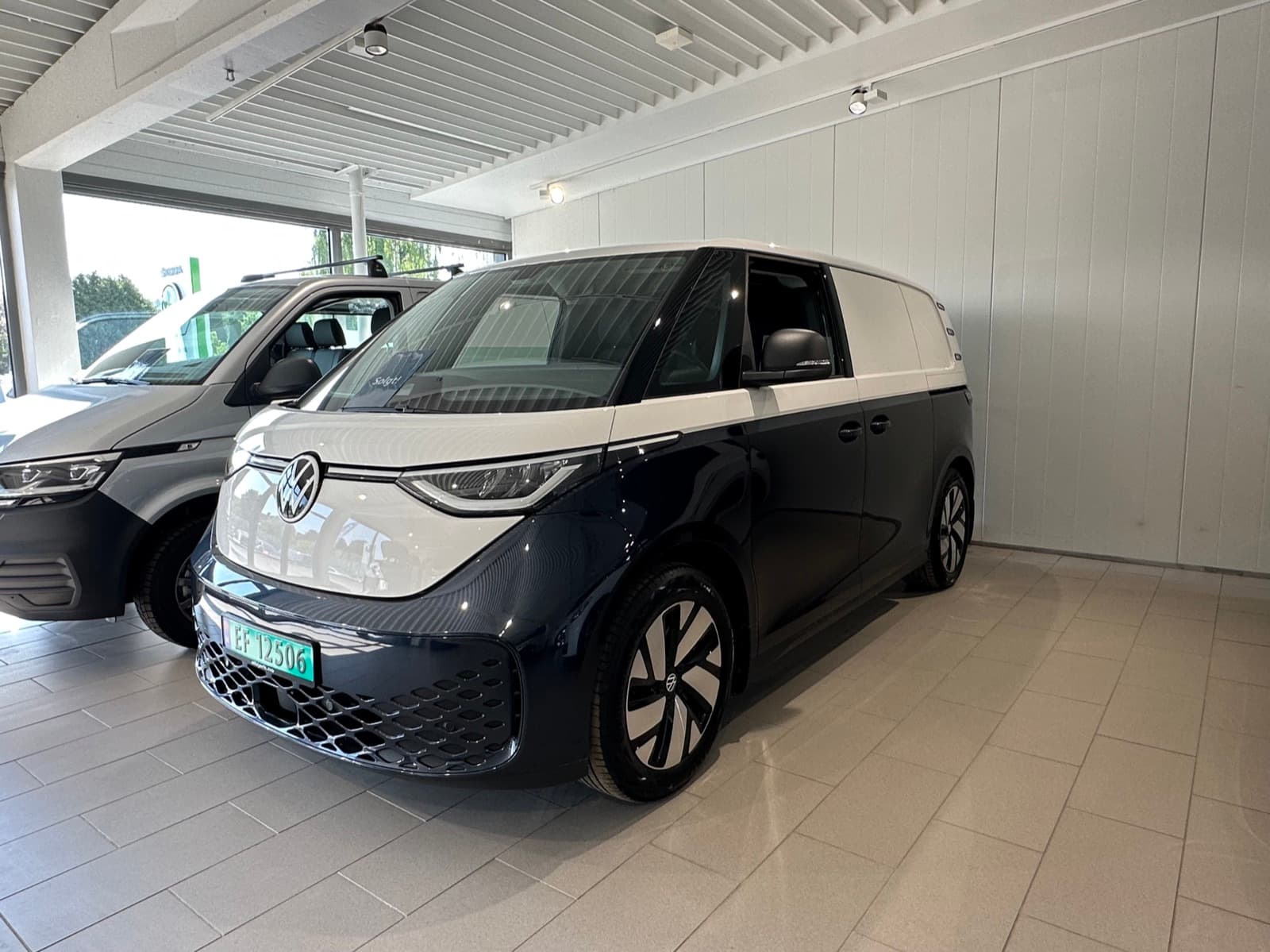 Volkswagen ID. Buzz electric van in two-tone black and white, rear three-quarter view
