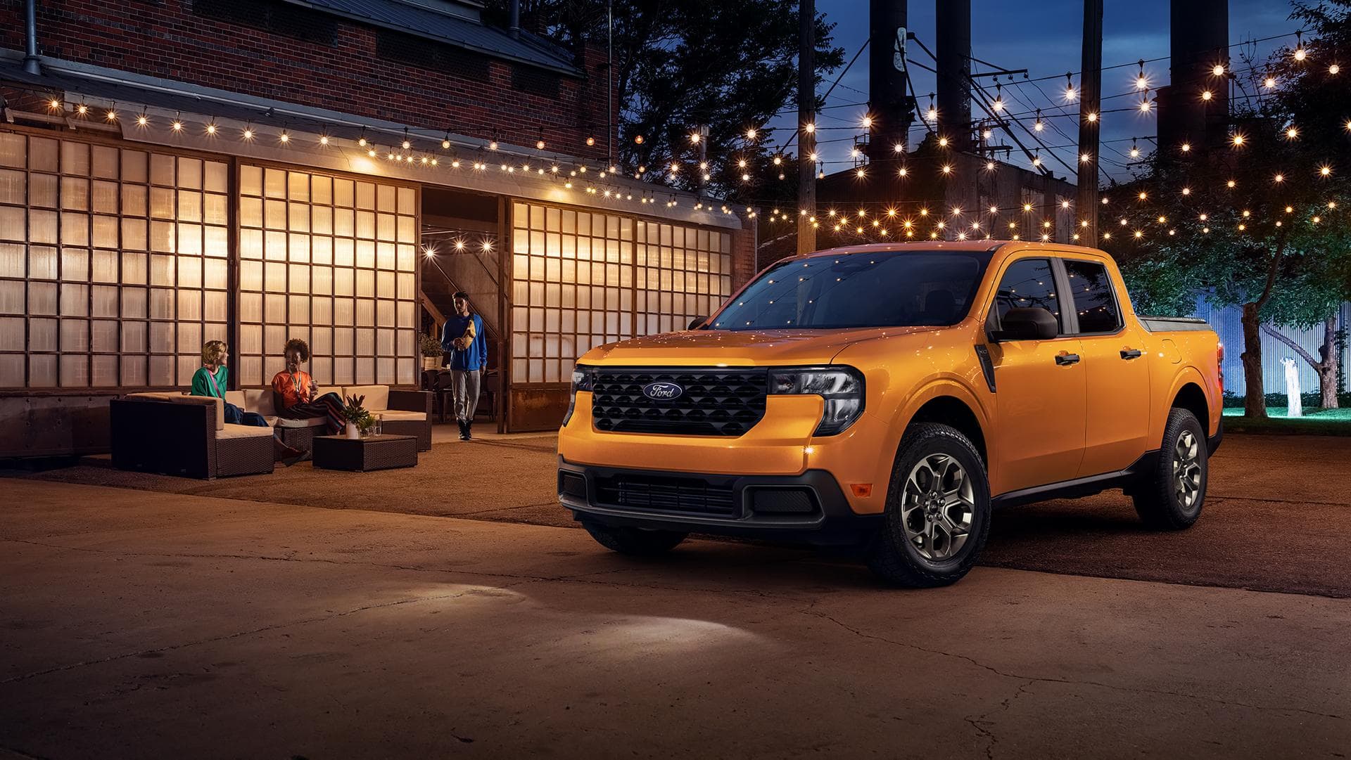 2026 Ford Maverick Hybrid in Orange Fury, official Ford lifestyle image