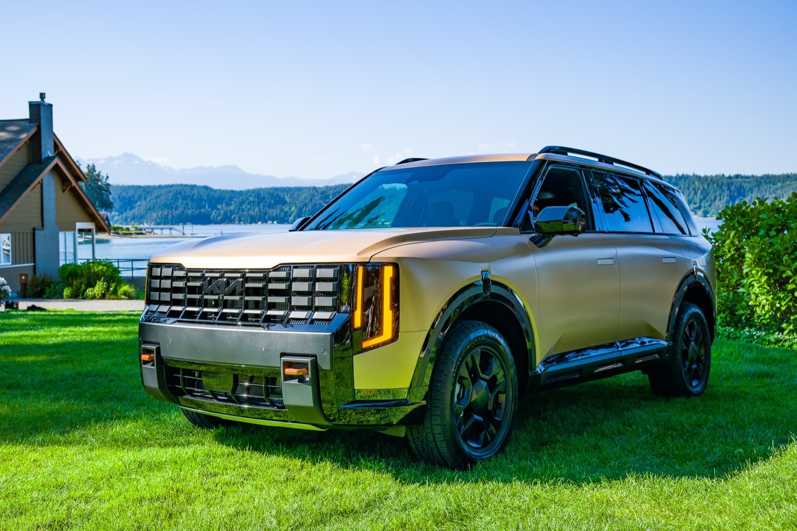 2027 Kia Telluride X-Pro front three-quarter view in matte sand, official Kia press image