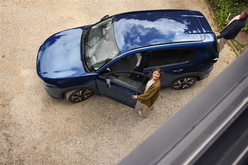 The all-new 2026 Mazda CX-5 in Navy Blue Mica, official front three-quarter press image