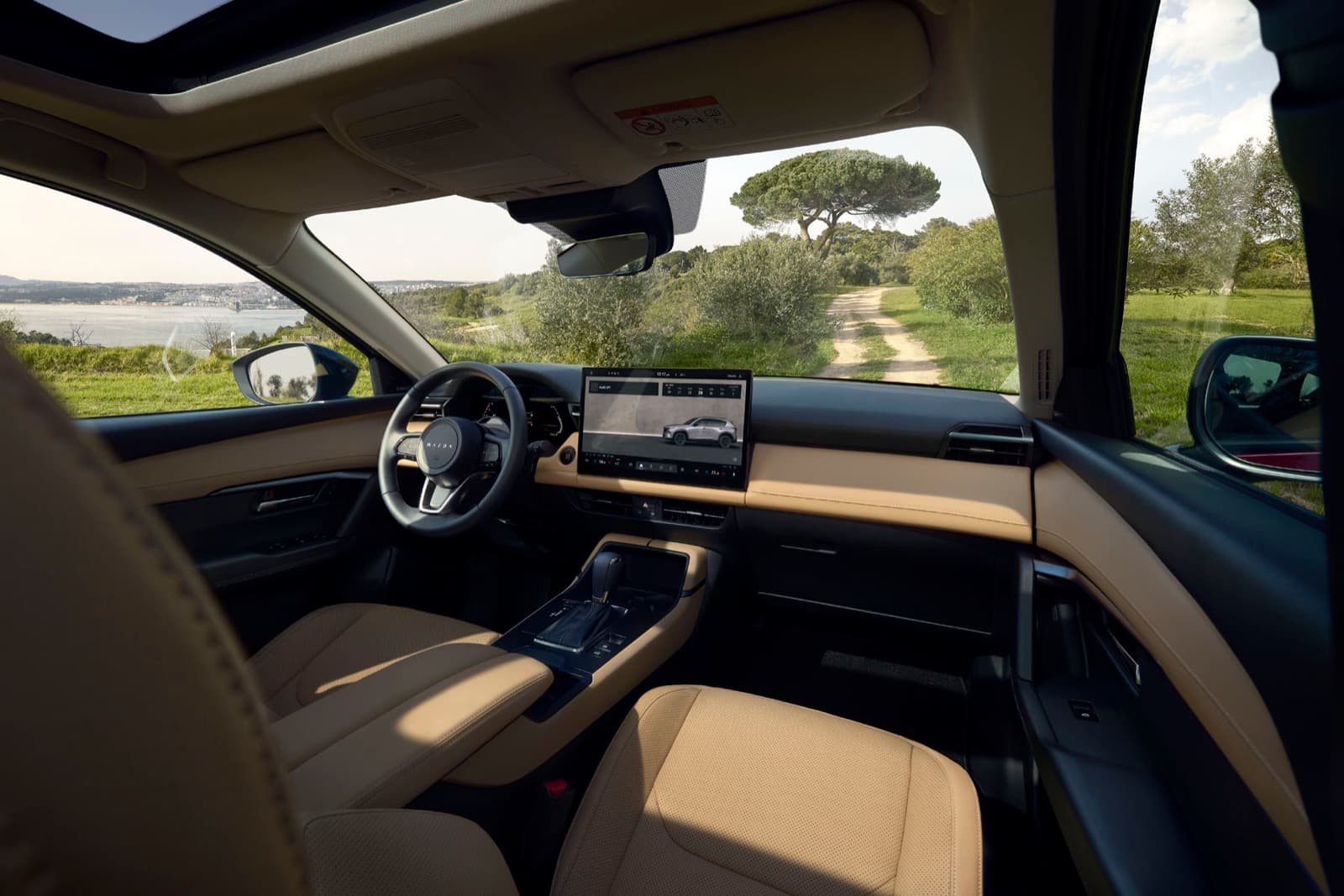 2026 Mazda CX-5 dashboard with the 15.6-inch center touchscreen in a tan interior