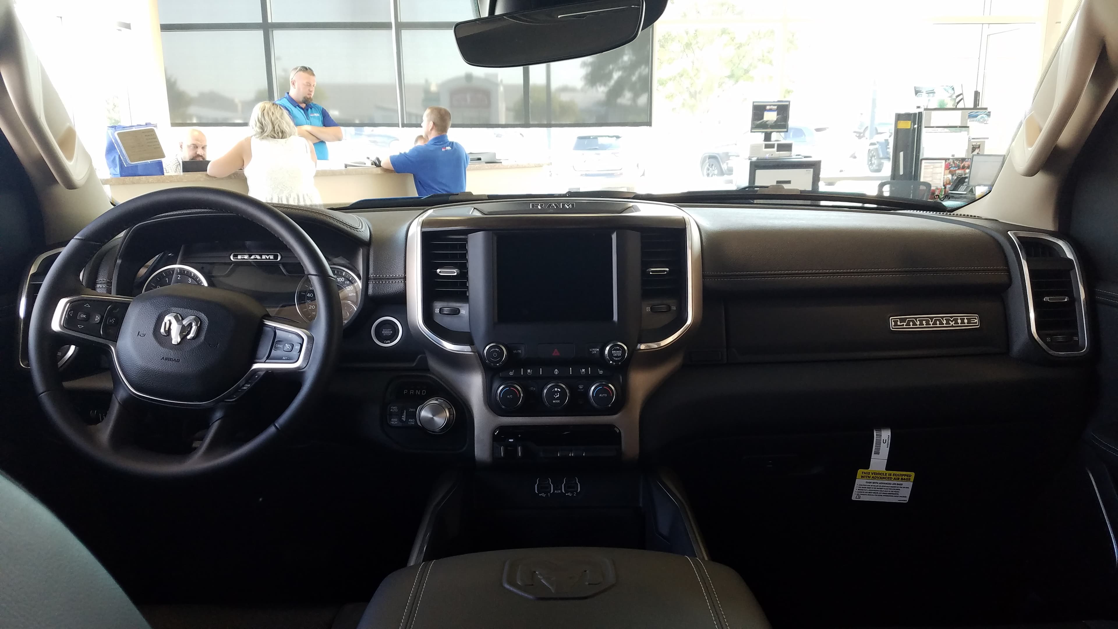 Interior dashboard of a Ram 1500 Laramie crew cab pickup truck