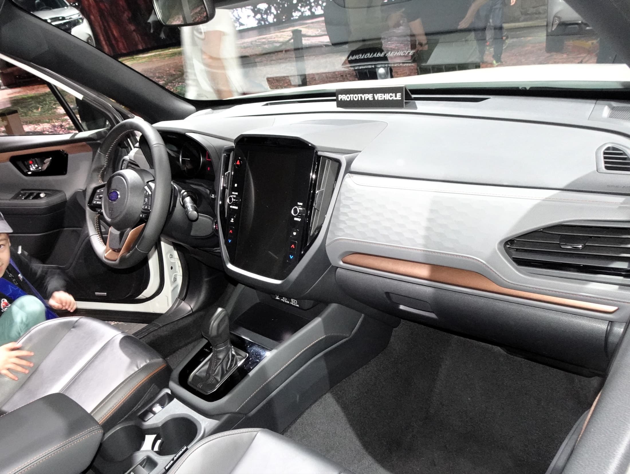 Current-generation Subaru Forester Sport interior showing dashboard, center screen, and two-tone trim