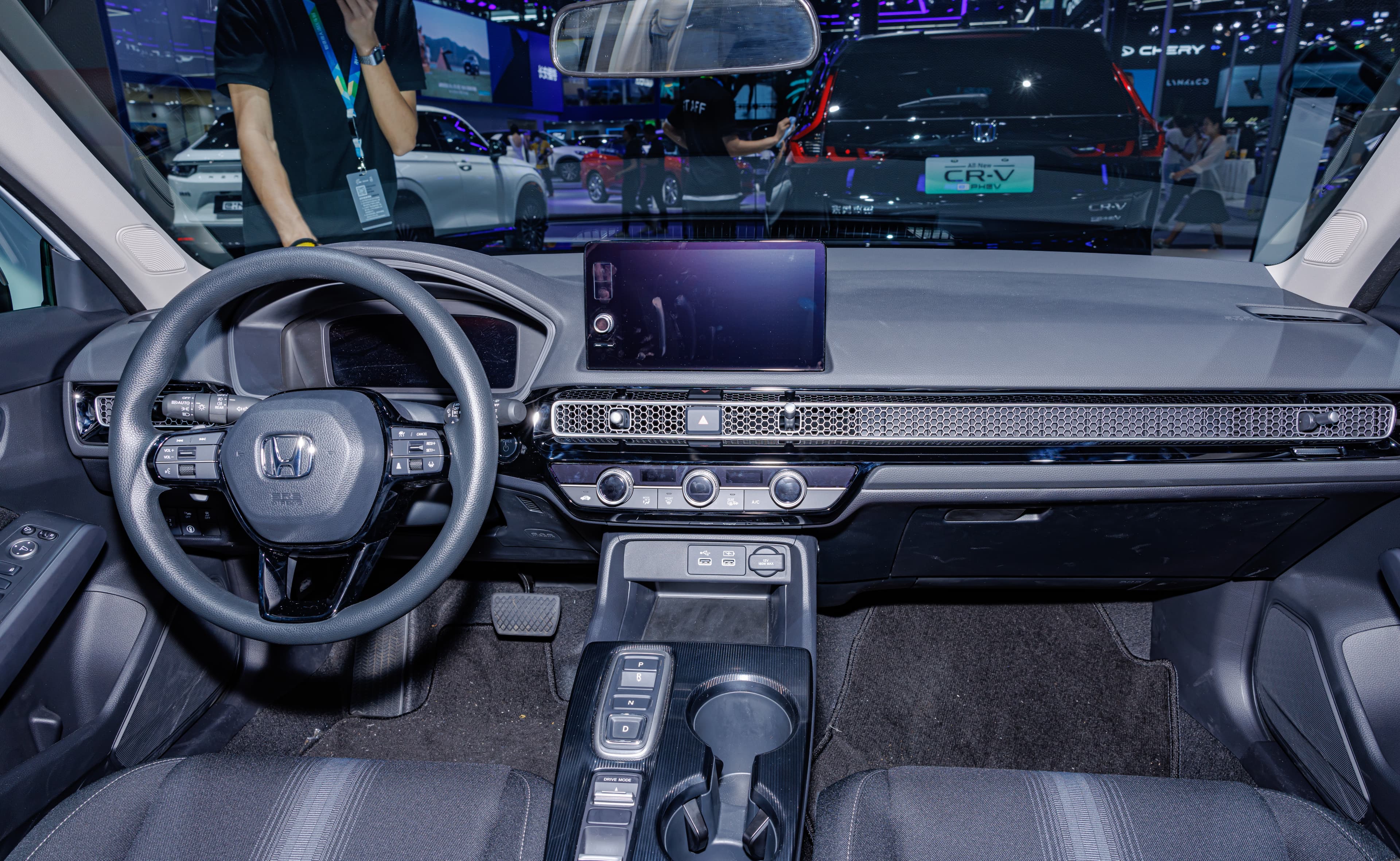 Honda Civic Hybrid interior with dashboard, steering wheel, and front seats
